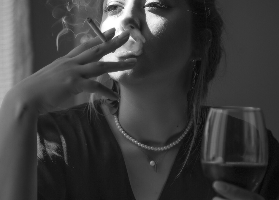 Two women, one a drinker one a smoker